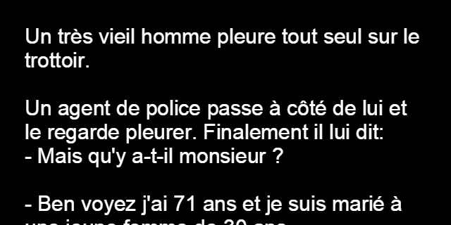 Un vieil homme pleure sur le trottoir
